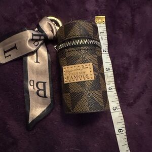 Checkered Brown bag keychain! Comes with mystery lipgloss that's color changing